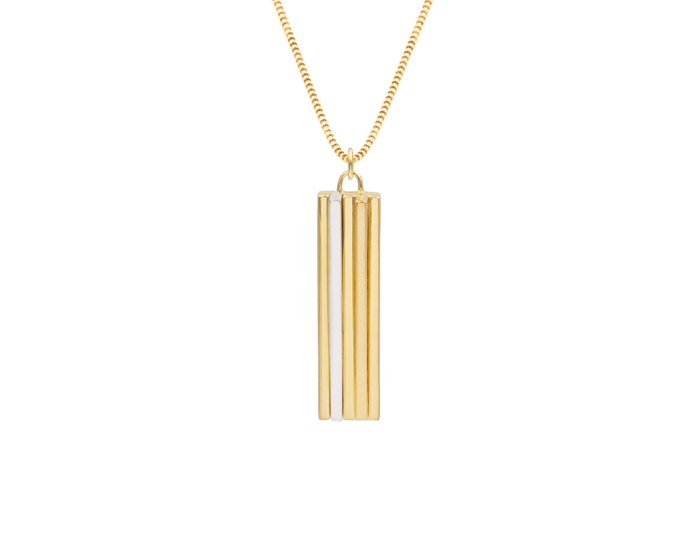 Layered gold and silver with a modern pearl accent: close-up of KIMSU mixed-metal styling featuring a delicate gold chain and architectural pendant.